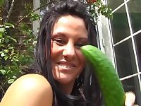 Naughty babe Crystel Lei drills her pussy with a big cucumber